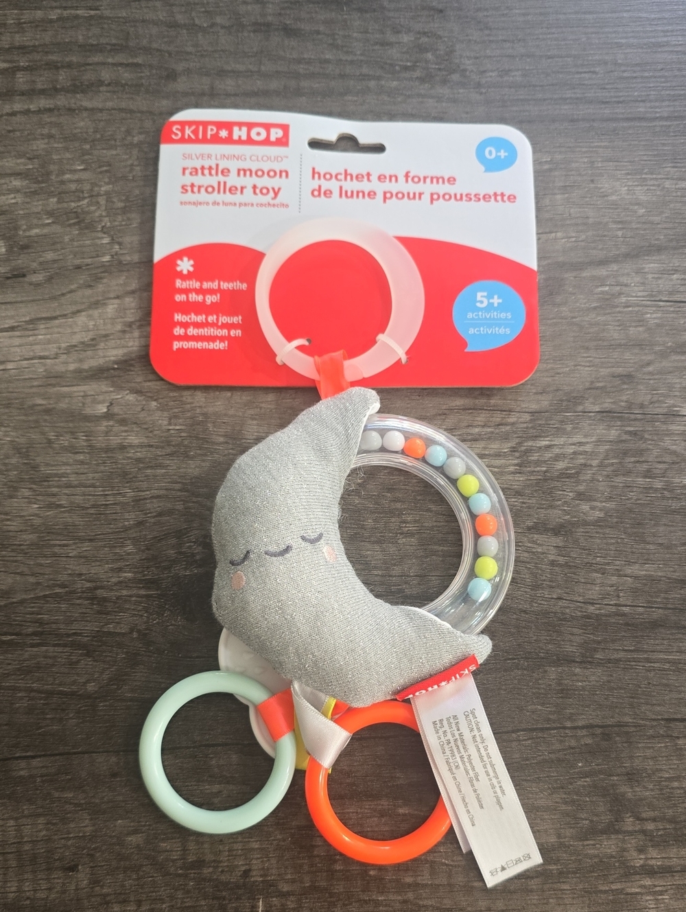 Skip Hop Silver Lining Cloud Rattle Moon Toy - Gray with Mint & Orange Rings